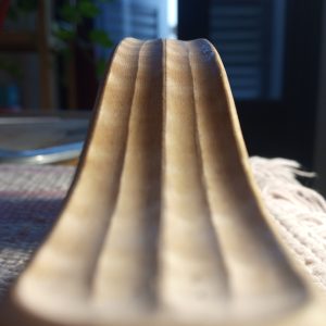 Violin scroll fluting